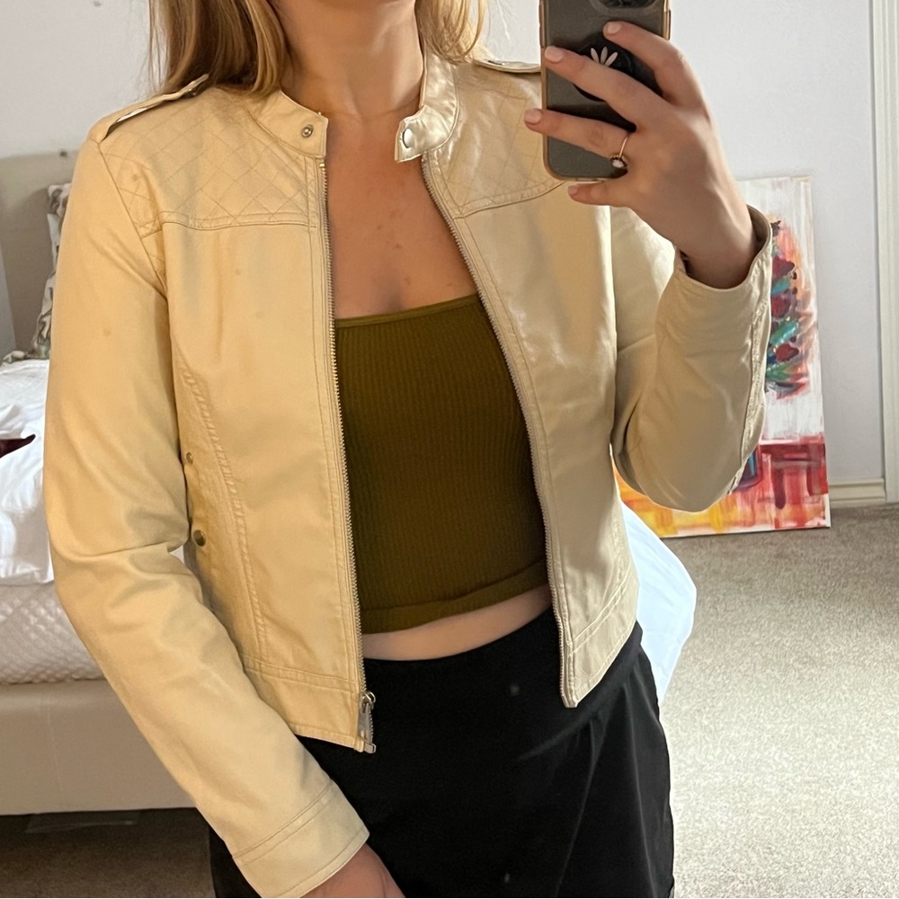 Never worn cream moto jacket. Size M